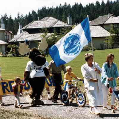 3111 - 03 - Marilyn Baker with flag, BC Parks Moose