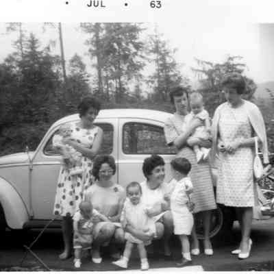 4903 - Women - kids in front of Volkswagon - July 1963.tif
