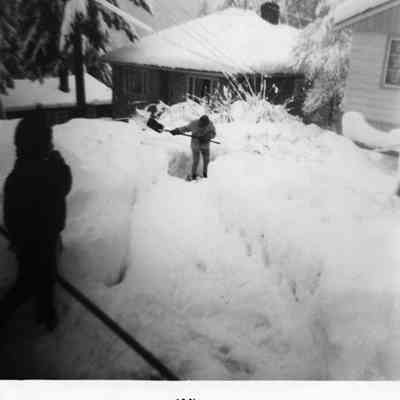 4739 - Shovelling Nordlund's sidewalk, DC 1967.tif