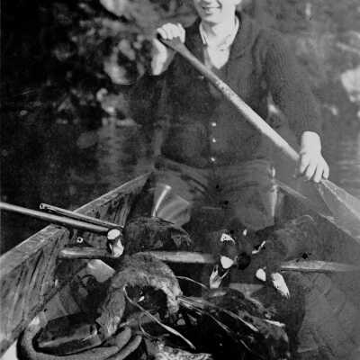 Art George with game in canoe