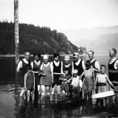 Family in swimming costumes, Deep Cove