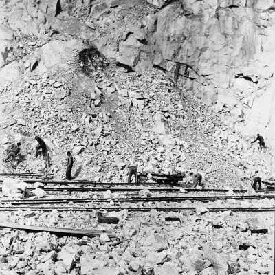 Granite Quarries Ltd, men piling rocks on flatbed