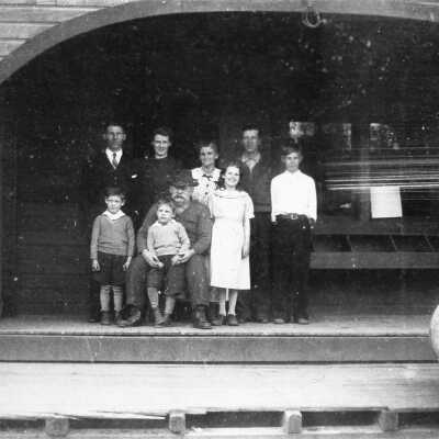 Moore family on porch of home