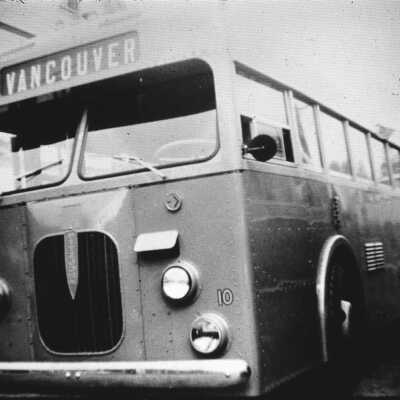 Deep Cove Bus outside old Moore house