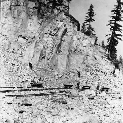 Granite Quarries Ltd - men piling rocks on flatbed