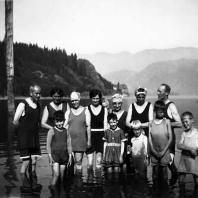 Family in swimming costumes, Deep Cove