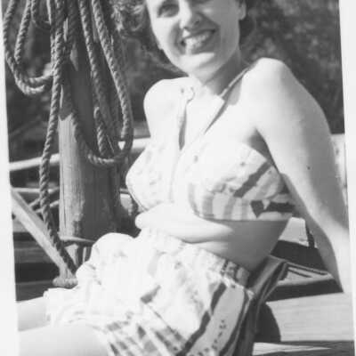 Jean Craig bathing suit photo sitting on boat at Roche Pt