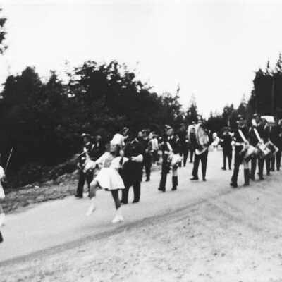 Kinsmen, July 1st Parade - 1953 0035- Majorette and parade