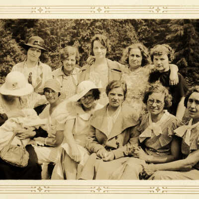 Parents and teachers in school grounds