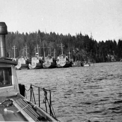 Ladybird (Norcross boat) with Surplus Navy Ships