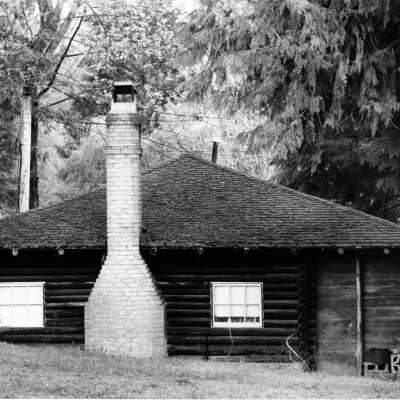 Log cabin, canoe rentals 1986
