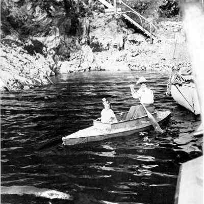 Woman with Child in boat