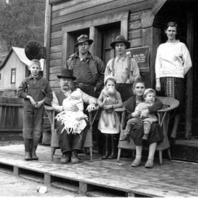 Moore family on porch of home