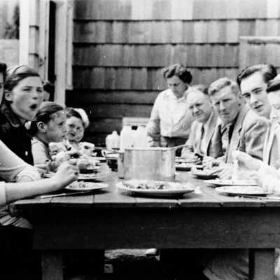 Dollarton; Jean and Bill Craig's home, picnic around Dollar Mill table
