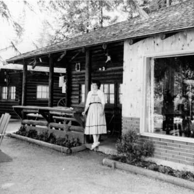Deep Cove Motel, Reta Thornley outside their home