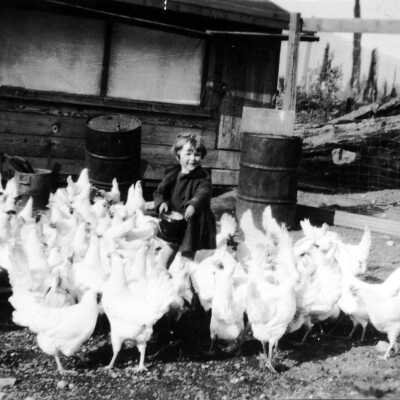 Kit Penny with chickens