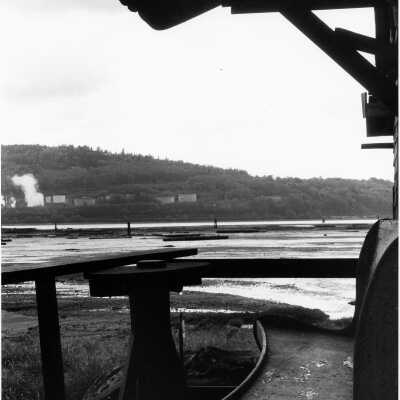 Maplewood Mudflats view to refinery, bench and table on deck