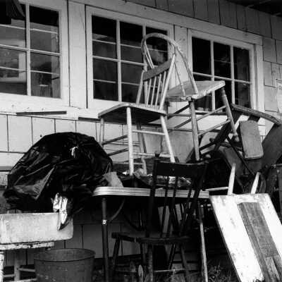 Cove Canoe Rentals with tables and chaird stacked outside