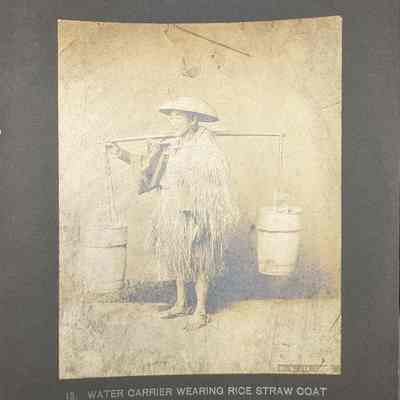 Water Carrier Wearing Rice Straw Coat