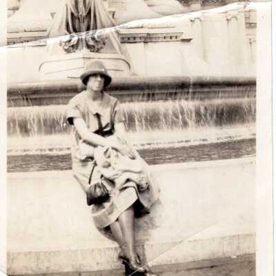 Portrait of Woman in Front of Fountain