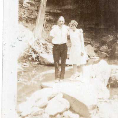 Couple By Creek
