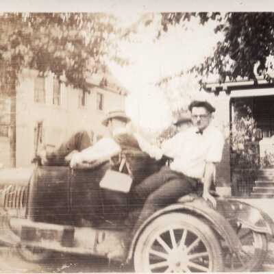 Men Sitting in Automobile