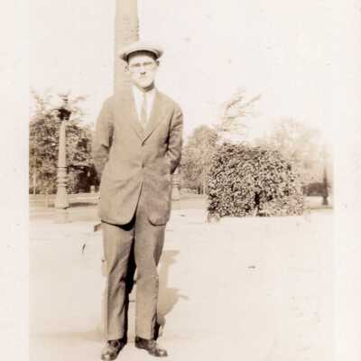 Man Standing in Front of Pillar