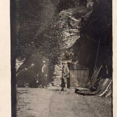 Men in Rocky Landscape
