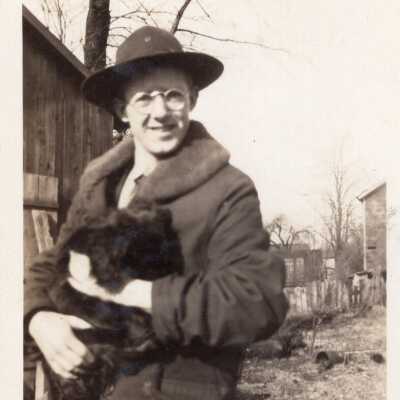 Man Holding Animal