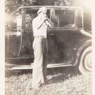 Man in Front of Automobile