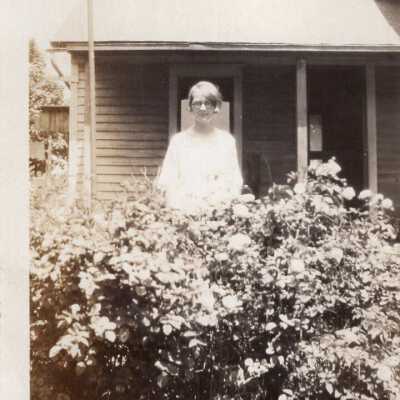 Woman By Bush