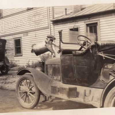 Man Filling Automobile