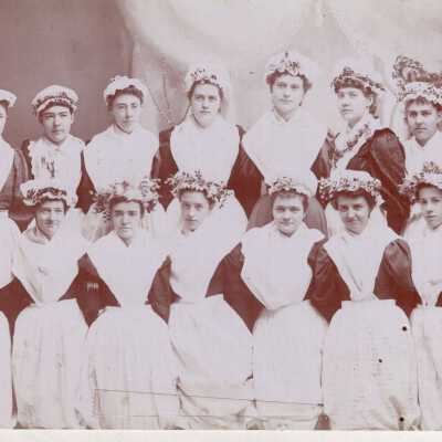 Group of Women in Floral Bonnets