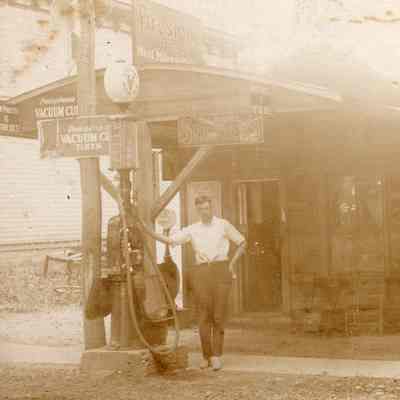 Man In Front Of Gas Station