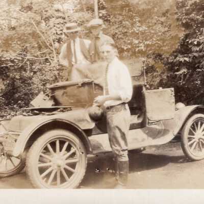 Three Men By Automobile