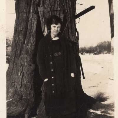Portrait of Woman by Tree