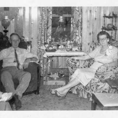 Couple Seated in Living Room