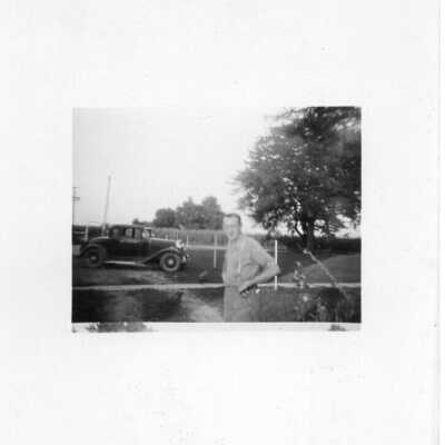 Portrait in Front of Automobile