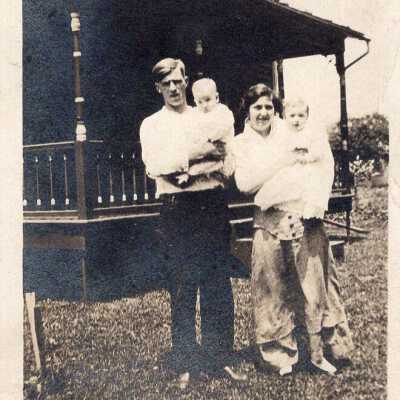 Couple Holding Babies