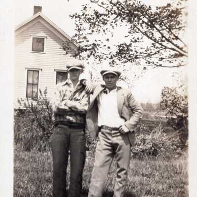 Two Men in Yard