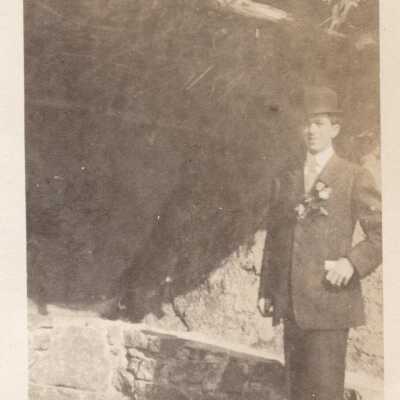 Man in Front of Stone Bench