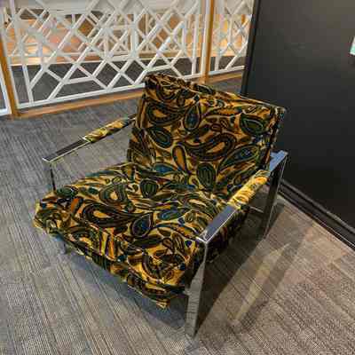 Steel upholstered lounge chair
