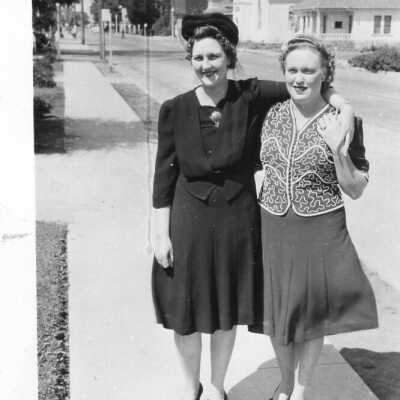 WWII Photo of two women standing on a sidewalk