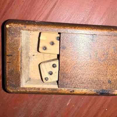 Small wooden box with dice