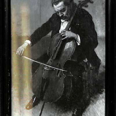 Framed photo of man playing cello