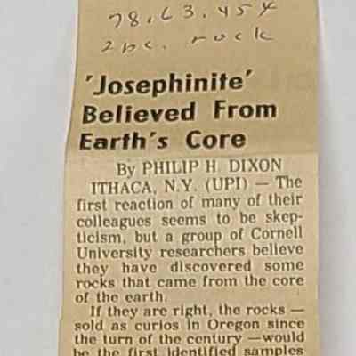 Newspaper article included with the 2 specimens