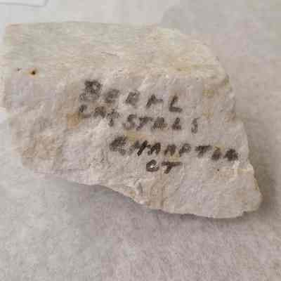 "Beryl crystals E. Hampton CT" written on the underside in permanent marker