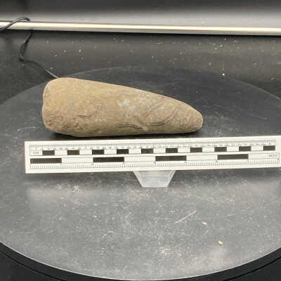 Pestle with design (?)