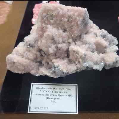 Rhodochrosite on Druzy Quartz