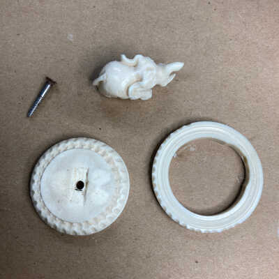 Holder before treatment and with screw removed